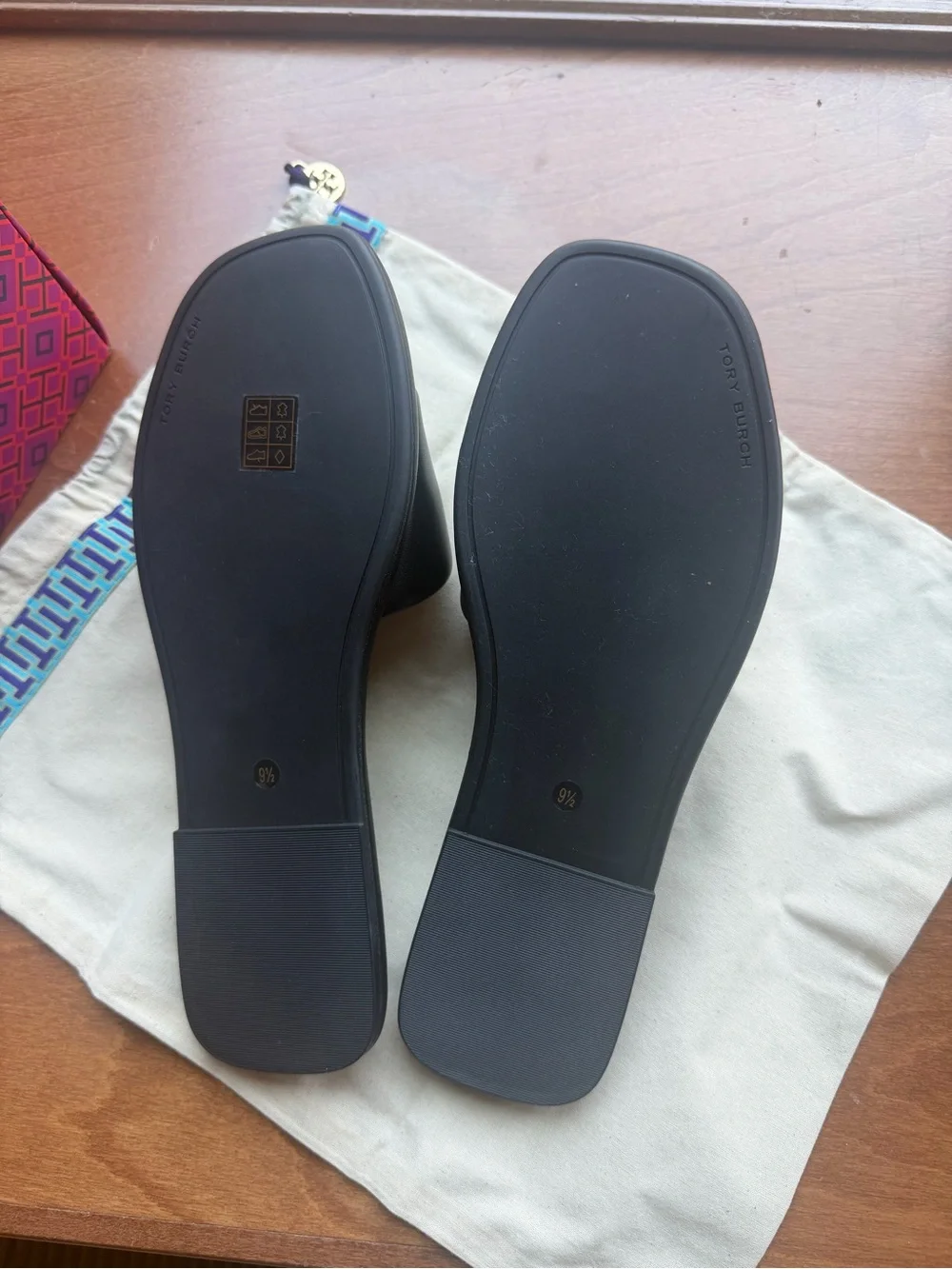 Tory Burch Black Slide Mules with Gold-Trim Logo